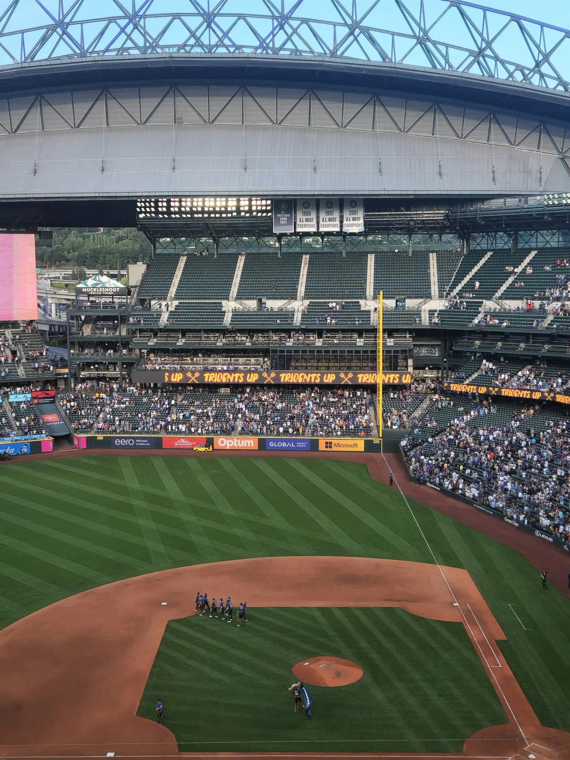 Baseball field and spectators inside a stadium