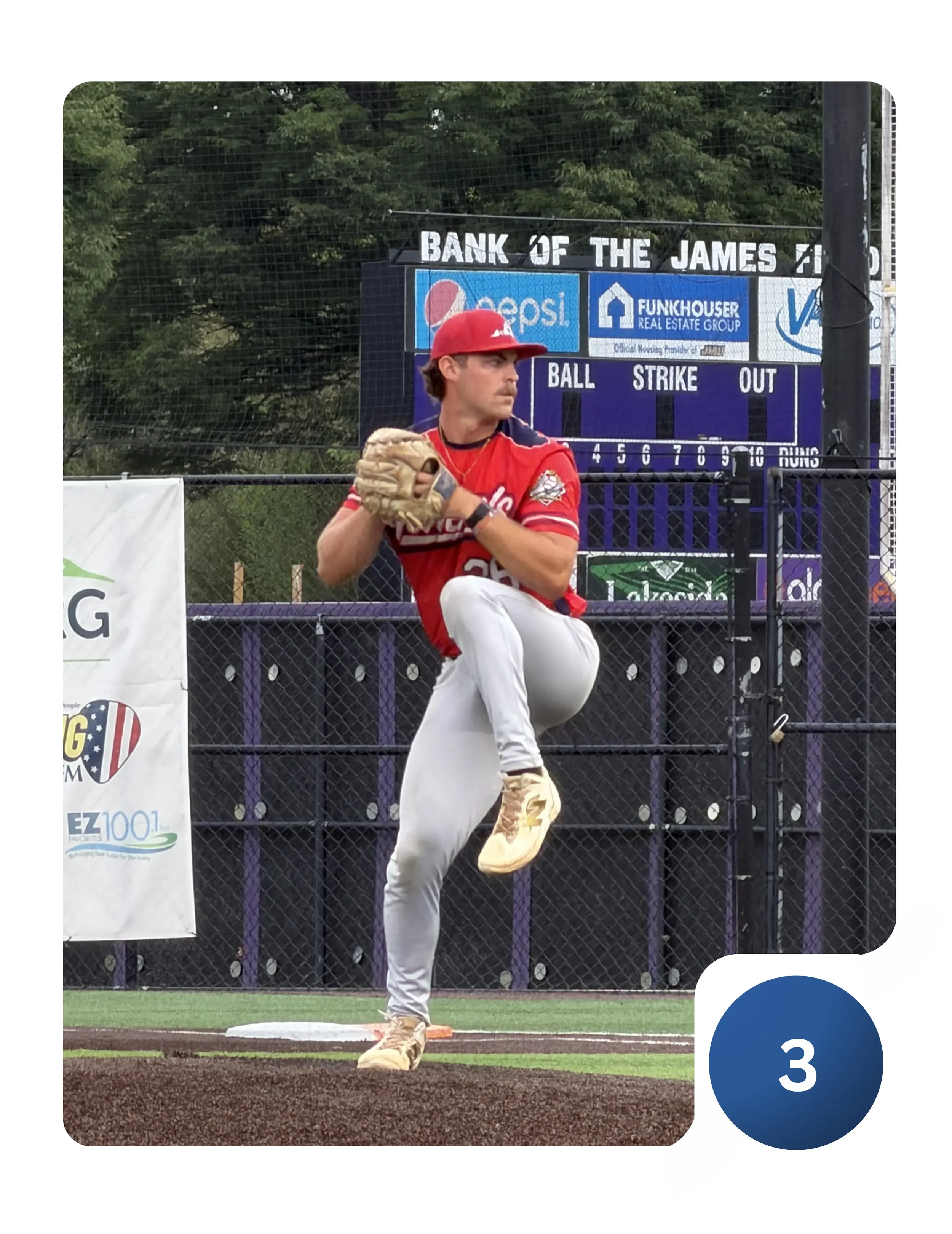 Baseball pitcher delivering a pitch