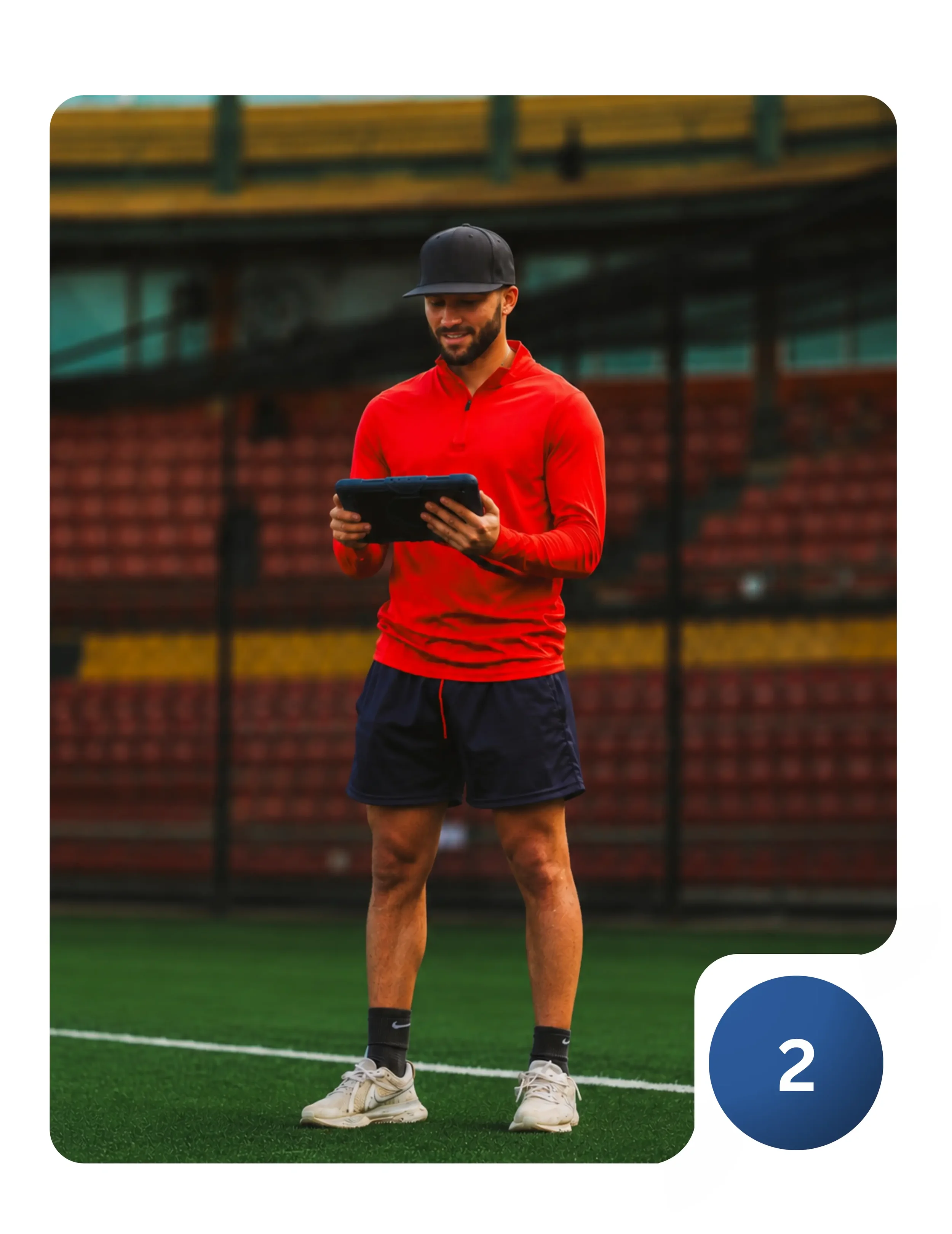 Coach reviewing player performance on a tablet
