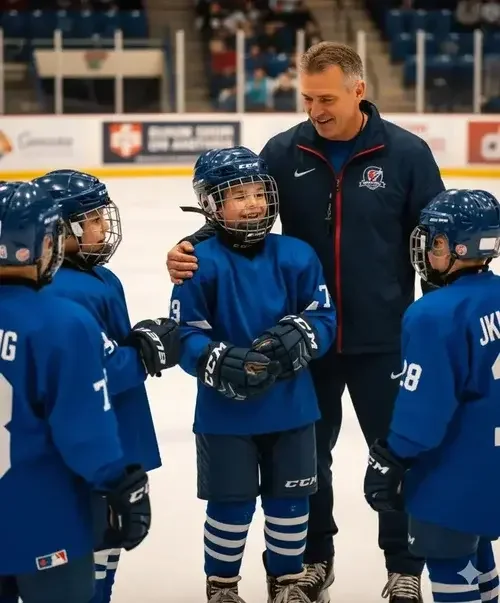 Coach speaking with youth ice hockey players