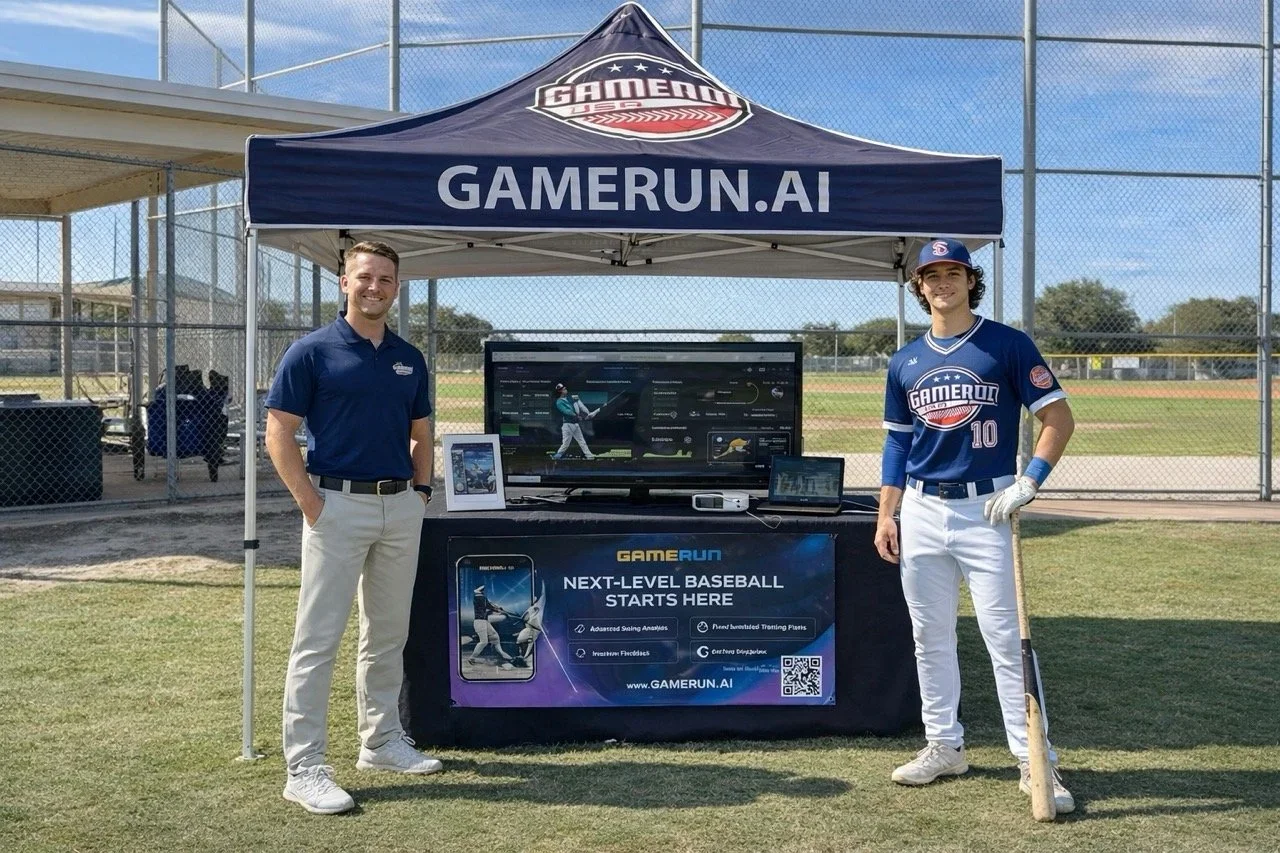 GameRun booth with staff at a baseball field