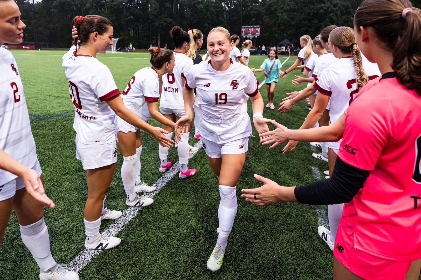 Sam Roarty, wearing number 19, with her Boston College soccer teammates